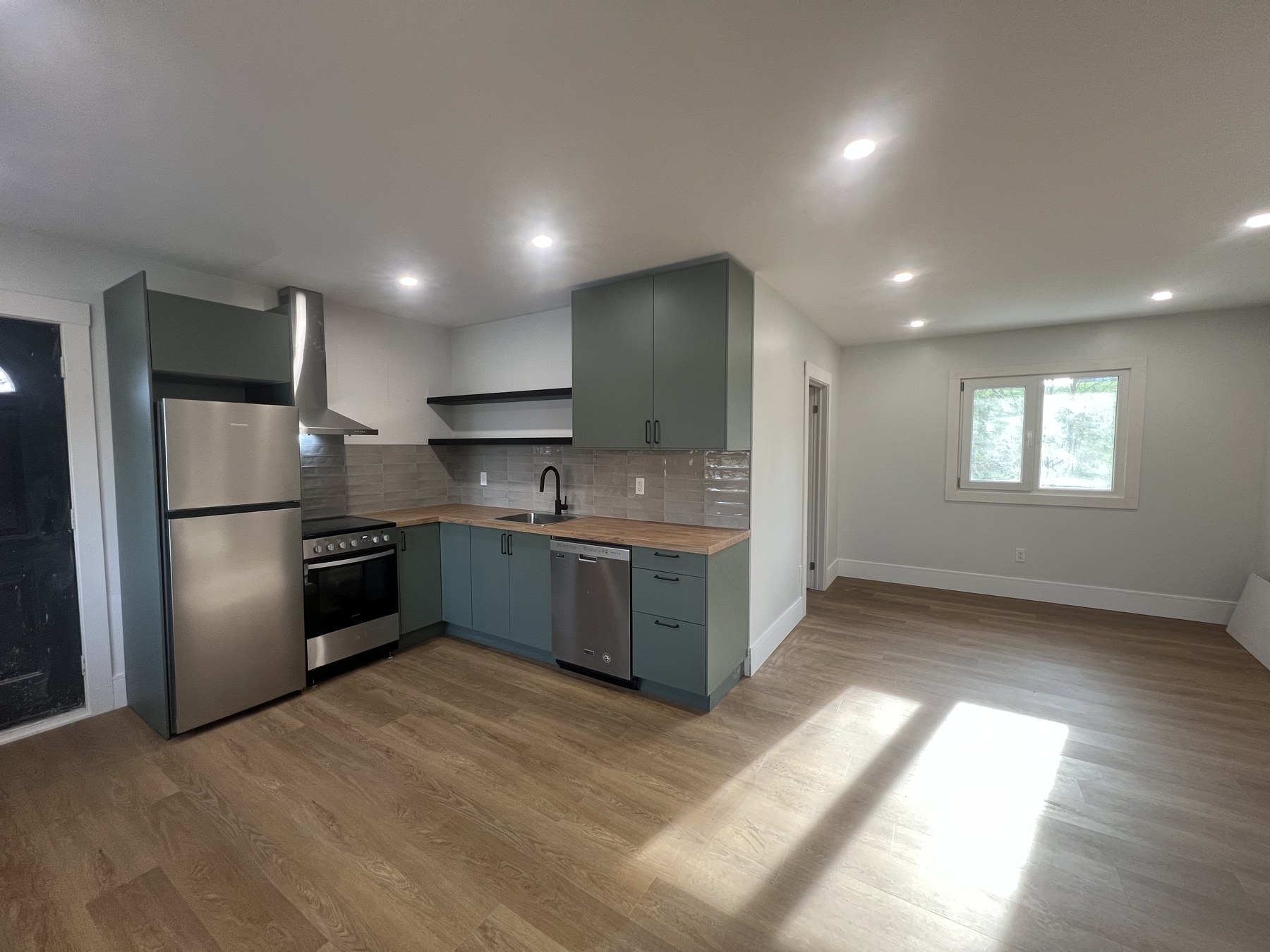 Detached garden suite open-concept kitchen and living