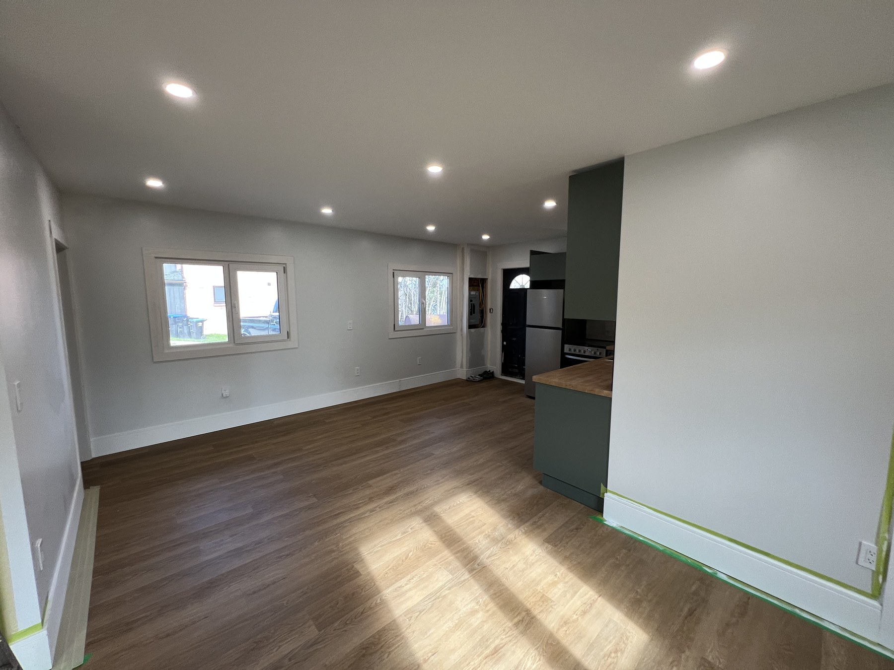 Bright living area with European windows and tall ceilings